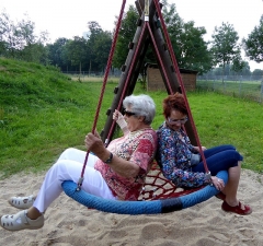 old ladies on swing