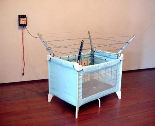 Funny Pictures of Baby Playpen with Barbed Wire