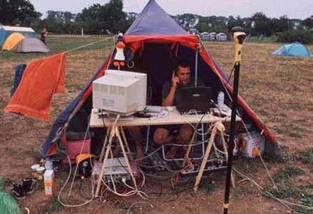 Funny Pictures of Of Man In Tent With Computer