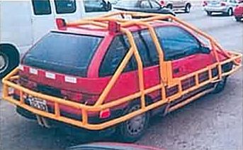 Funny Pictures of Car Surrounded by Bumper Bars