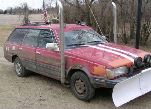 Funny Pictures of Car With Exhaust Stacks and Plow
