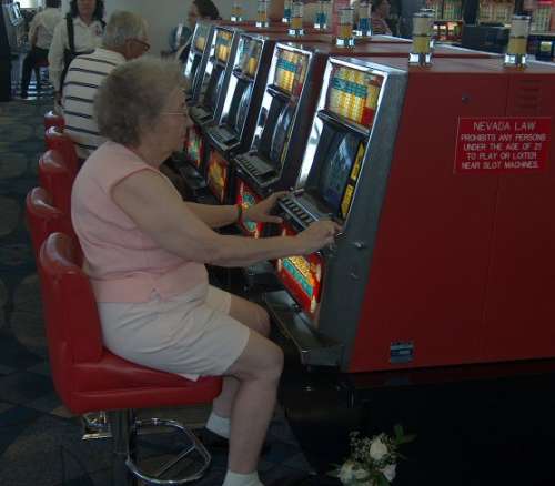 Funny Pictures of Grandma Playing Slot Machine in Las Vegas