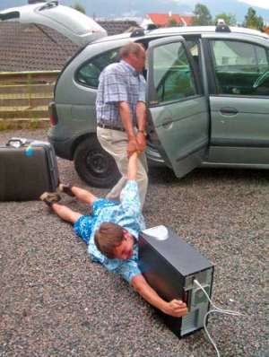 Funny Pictures of Kid Dragged to Summer Camp