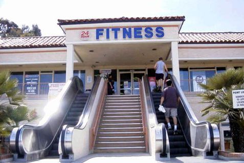 Funny Pictures of Fitness Sign By Escalators.