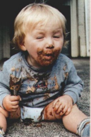 Funny Pictures of Little Boy Covered By Chocolate.