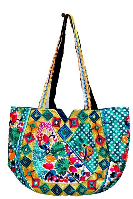blue lady's embroidered hand bag