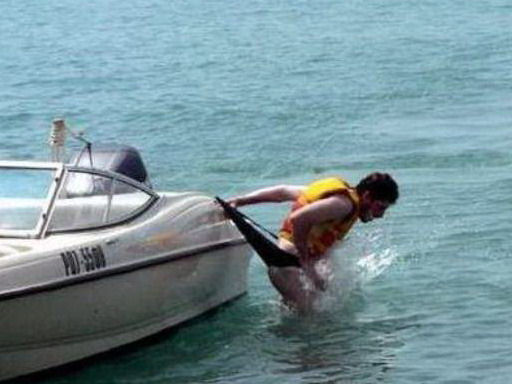 A funny boating pictures of a guy geting a wedgy