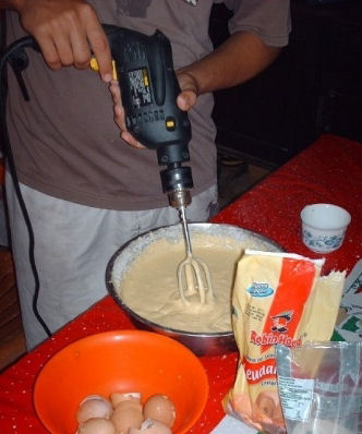 Drill being used as as a mixer.