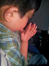 boy praying