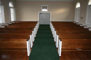 A picture of empty pews