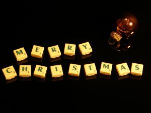 merry christmas spelled with scrabble tiles