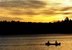 sunset and canoe