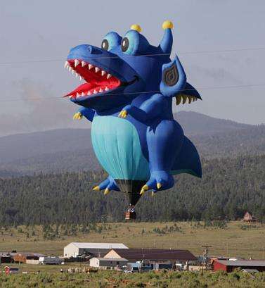 Funny Pictures of Dragon Baloon Over Farm