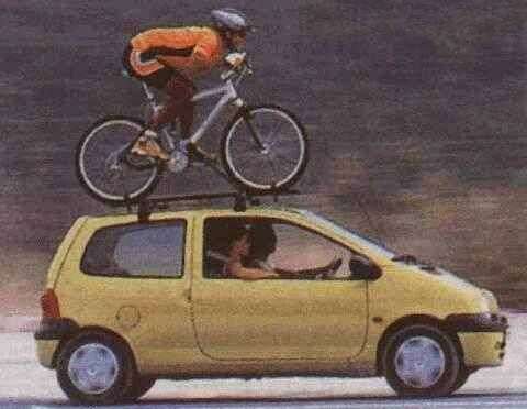 Funny Pictures of Bike and Rider on Roof of Car