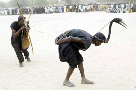 Funny Pictures of Guy Hunting Bird Man In Costume