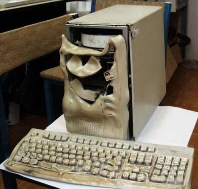 Funny Pictures of Melted, Overclocked Computer