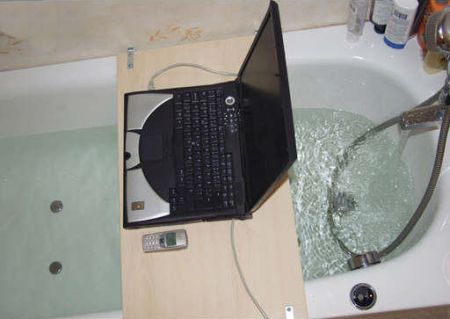 Funny Pictures of Laptop and Cell Phone in Bath Tub