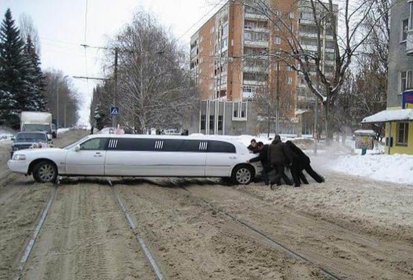 Picture of limo in a winter storm.