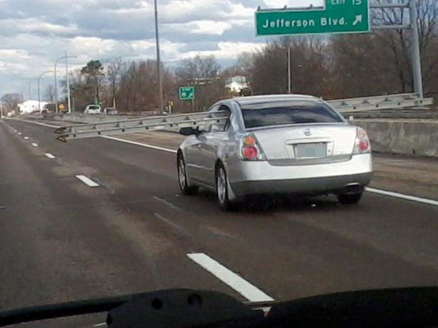 car with ladder in windows