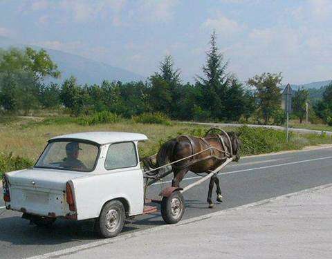 Funny Pictures of Horse Pulling Car Wagon