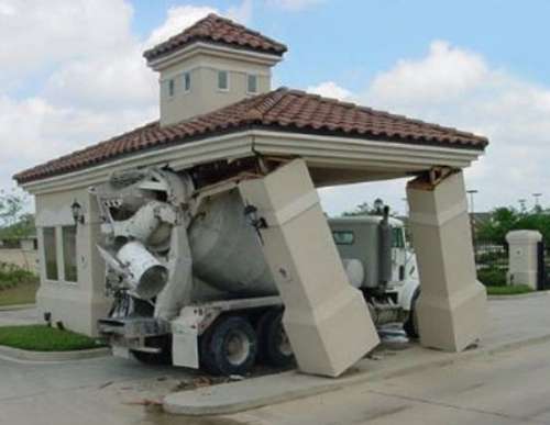 Funny Pictures of Cement Truck Hitting Bank Roof
