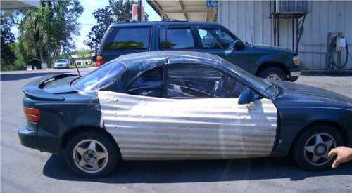 Funny Pictures of Car Repaired with Steel Roofing