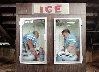 Funny Pictures of Football Players Sitting In Ice Box