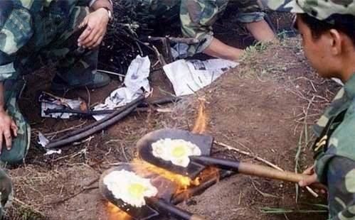 Funny Pictures of Eggs Frying On Shovels