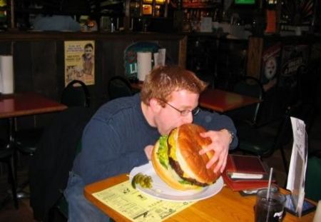 Funny Pictures of Guy Eating Giant Hamburger