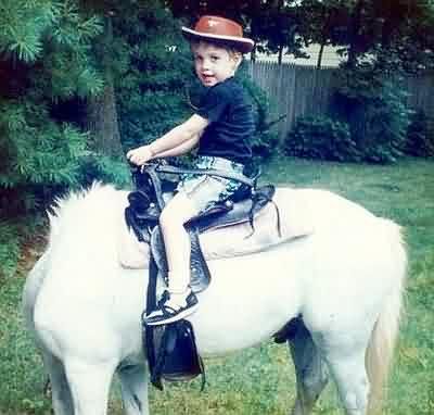 Funny Pictures of Boy on Headless Horse