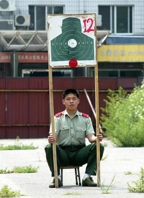 Funny Pictures of Soldier Holding Target