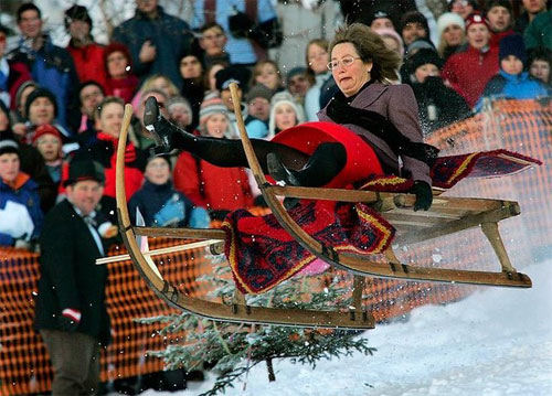 Funny Pictures of Mom On Winter Sleigh