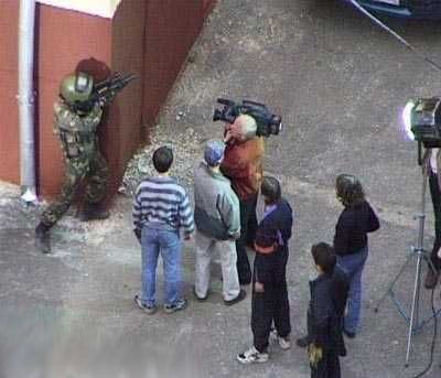 News Crew In Line Of Fire