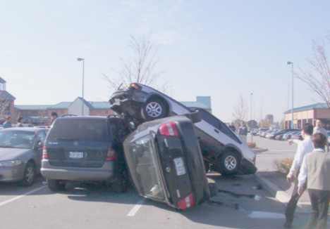Funny Pictures of Cars Crashed Fighting for a Parking Spot.
