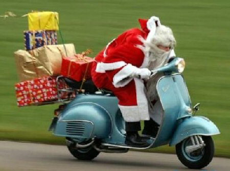 Funny Pictures of Santa Riding a Motorscooter