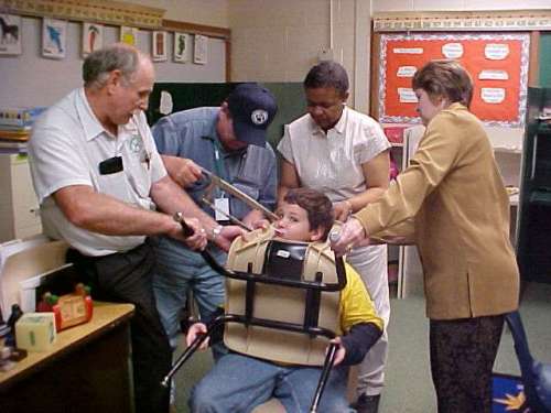 Funny Pictures of Kid With Head Stuck In Chair