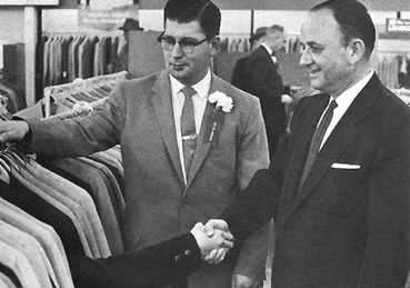 Funny Pictures of Suit Shaking Hands with Customer