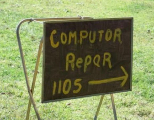 A funny computer repair sign