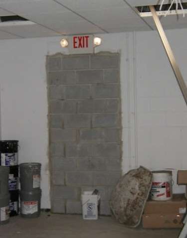 Funny Pictures of Exit Door Cement Blocked In
