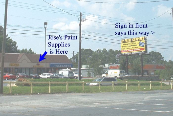 Funny Pictures of Paint Supply Sign Pointing Wrong Way