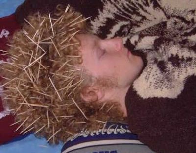 Funny Pictures of Guy Sleeping With Toothpicks In His Hair